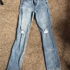 Women's Distressed Blue Jeans